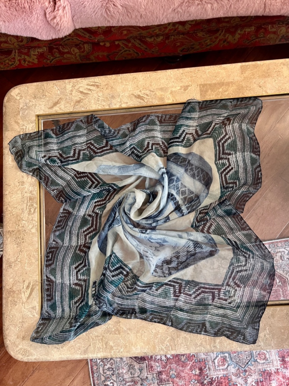 Square silk scarf with intricate graphic print of traditional woven baskets